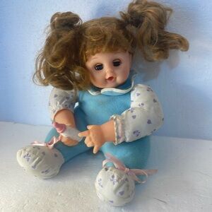 Vintage Y2K baby doll bottle sleepy blue eyes fully dressed brunette ponytail